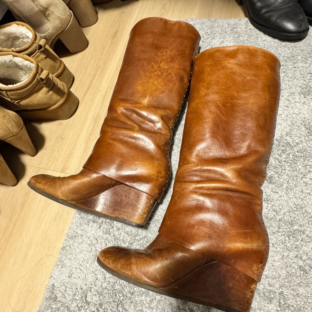 Steven by Steve Madden Cognac Leather Wedge Boot with fold over detail.